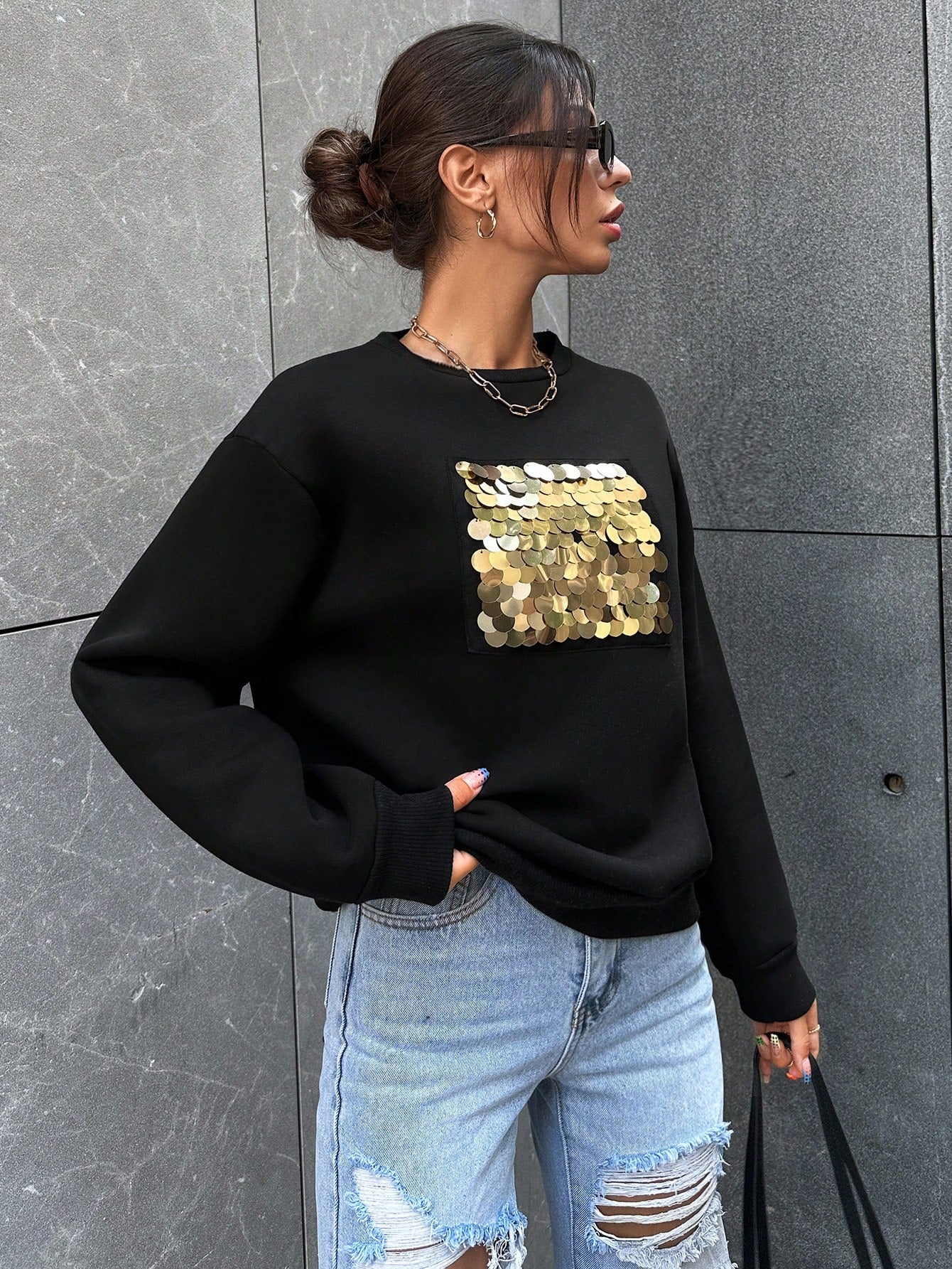 Tenue avec sweat pailleté noir