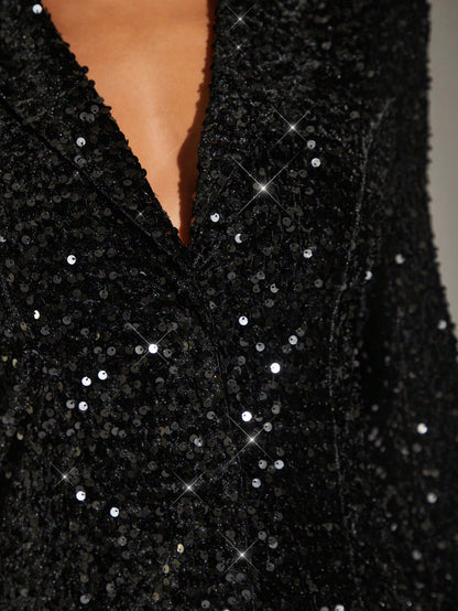Zoom sur robe blazer noir paillette