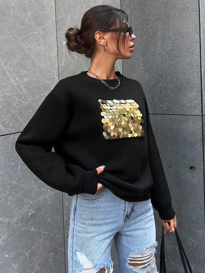 Tenue avec sweat pailleté noir